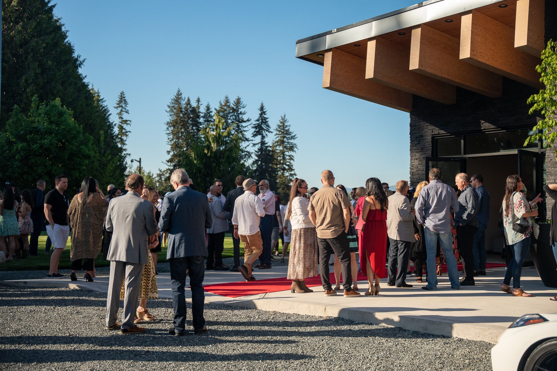 Guests arriving on the red carpet at the winery entrance