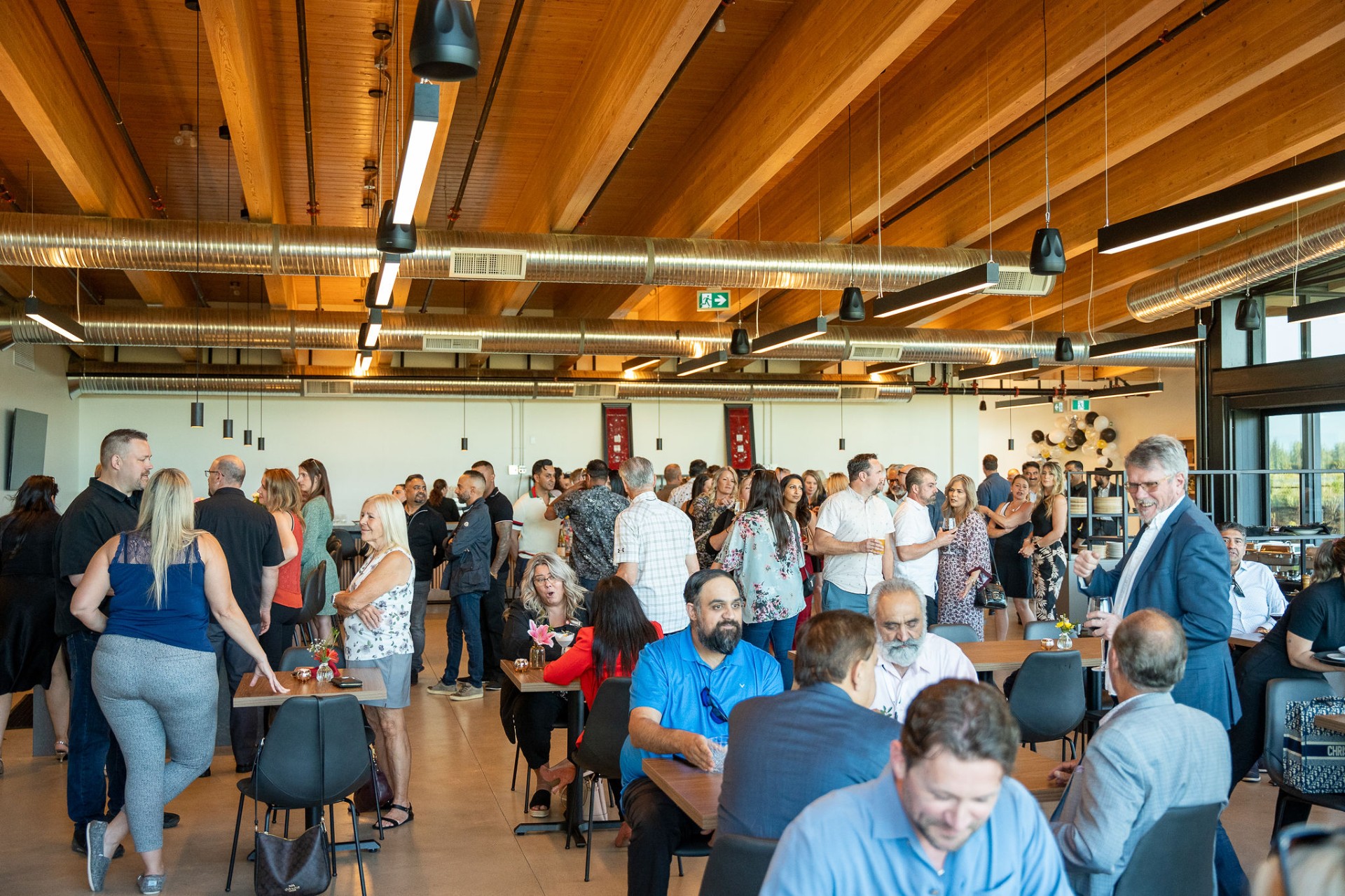 Corporate reception in the dining hall with timber beam ceiling