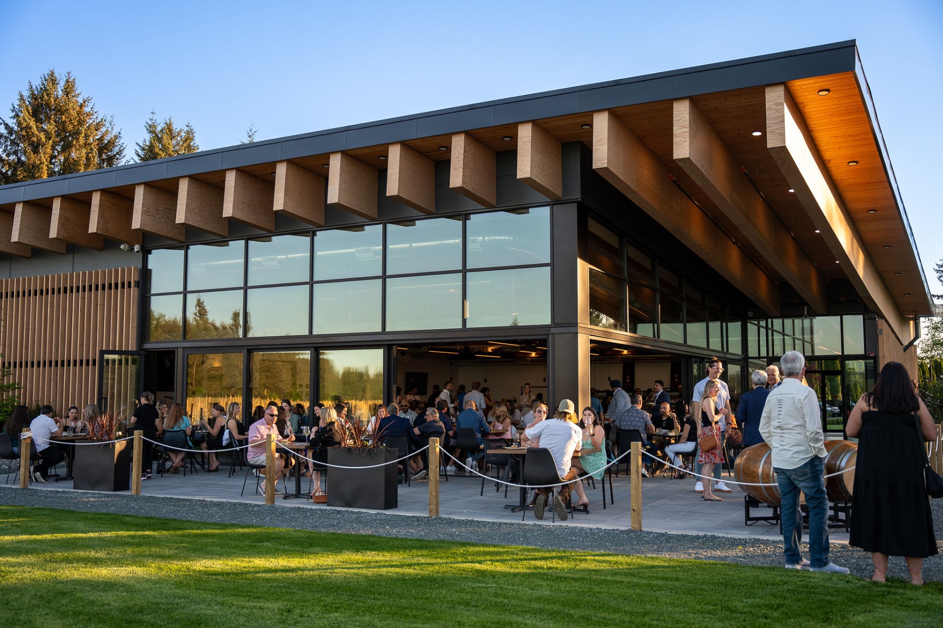 Outdoor patio reception with guests dining at the winery
