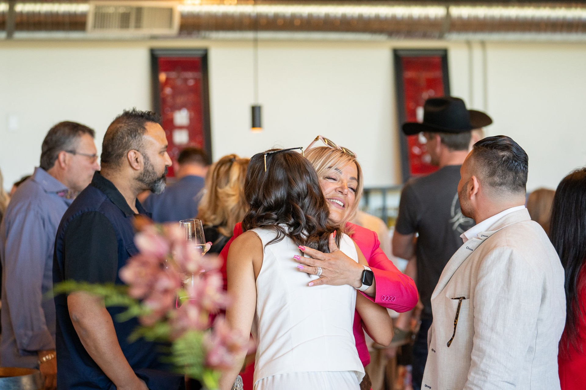 Guests greeting one another at a winery corporate gathering